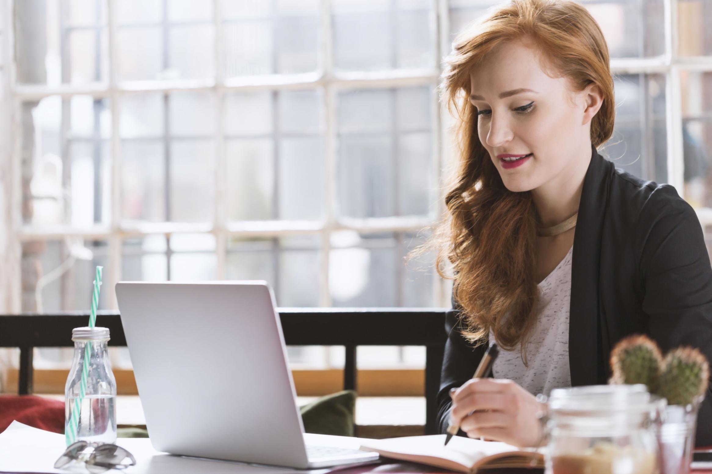 Learner reviewing structured course materials on a laptop